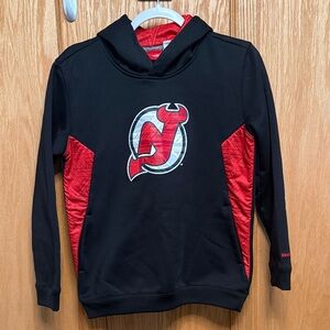 Reebok Black New Jersey Devils Hockey Hoodie with Red Accents and Logo

[118]